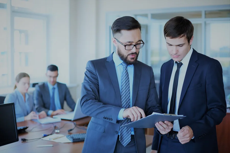 Reviewing prepared paperwork with a KS Consulting Group advisor
